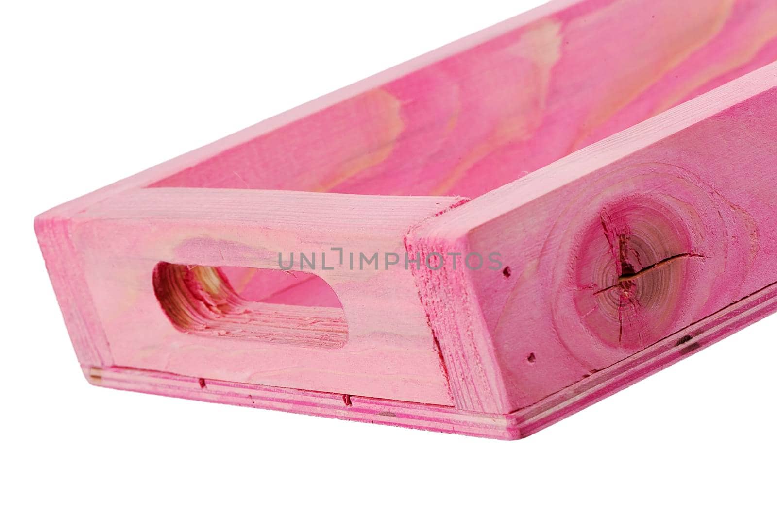 Fragment of a wooden box on a white background close-up