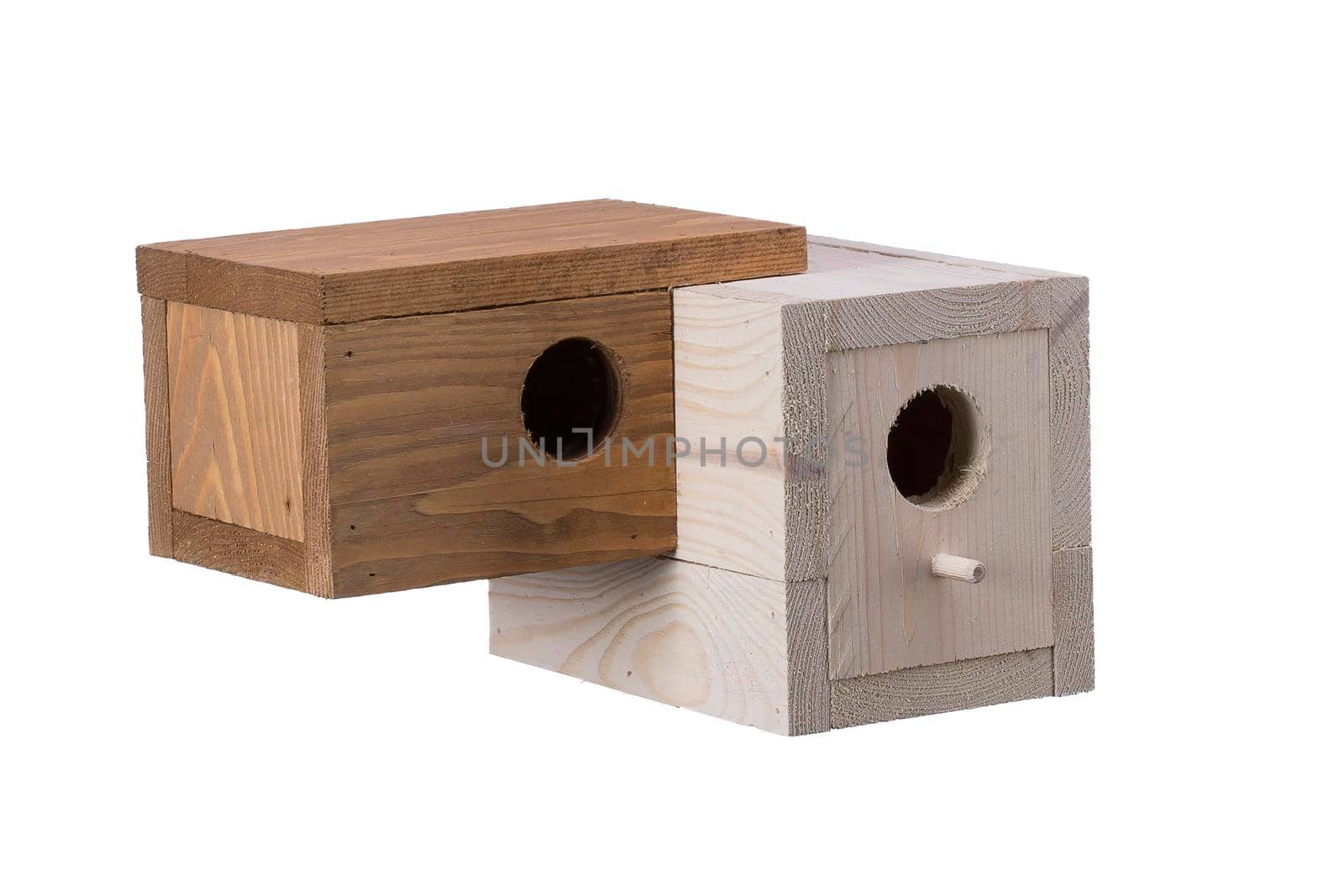 Wooden birdhouse on a white background