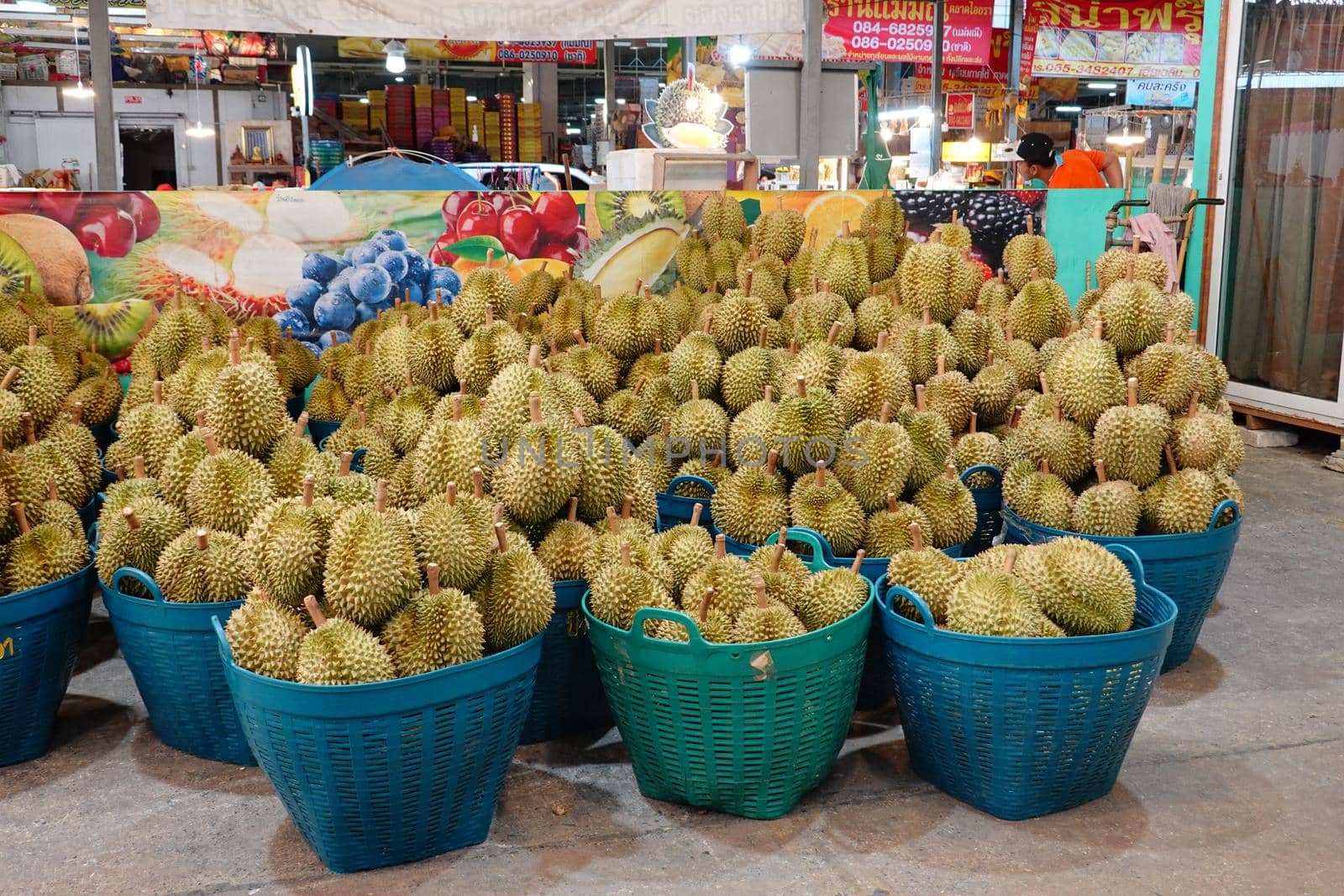 Basket full of durians at Talad Thai fruits market.