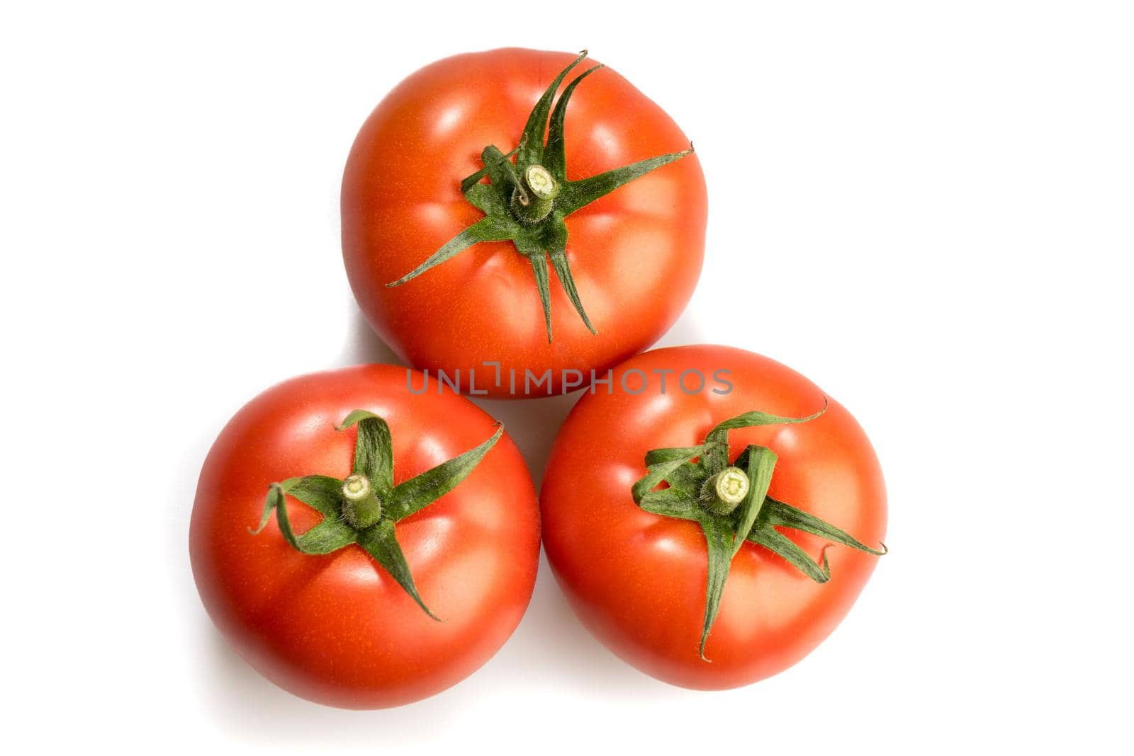 three realistic looking tomatoes in a triangle isolated white background by LeoniekvanderVliet