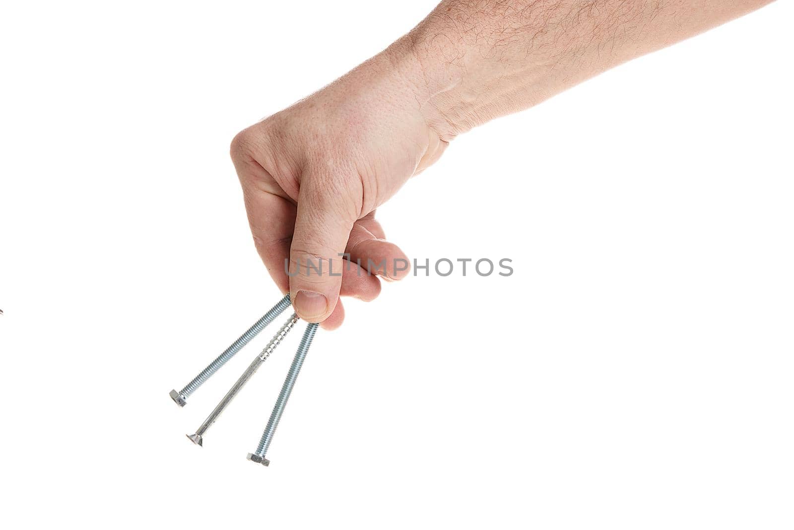 Hand holds metal screws on a white background, a template for designers. Close up