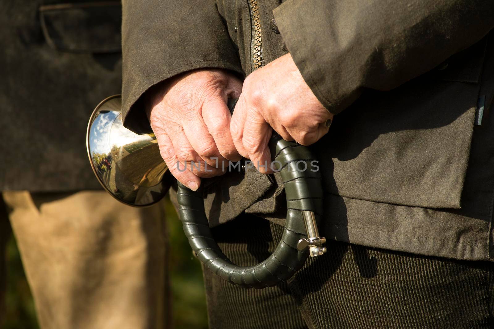 French horn band held in hands by a hunter on Saint Hubertus Day, 05/11/2017, De Moer, The Netherlands