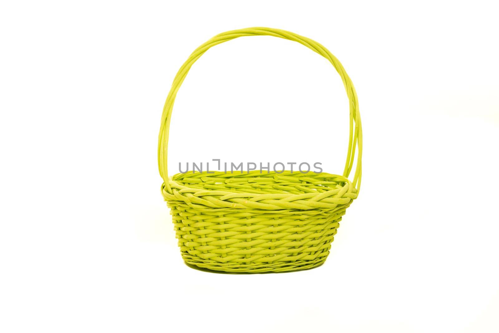 Empty green yellow basket isolated on a white background