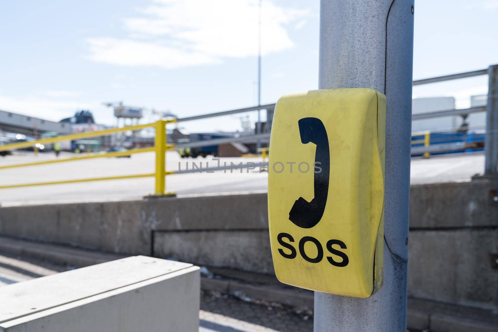 A yellow emergency phone box at Dover Harbour, England, United Kingdom