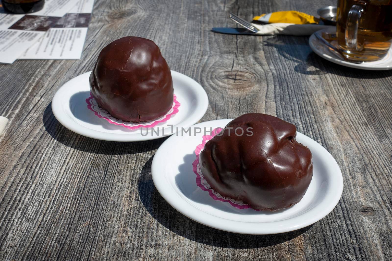 Bossche Bol, typical Dutch pastry with chocolate and cream from the city of Den Bosch by LeoniekvanderVliet