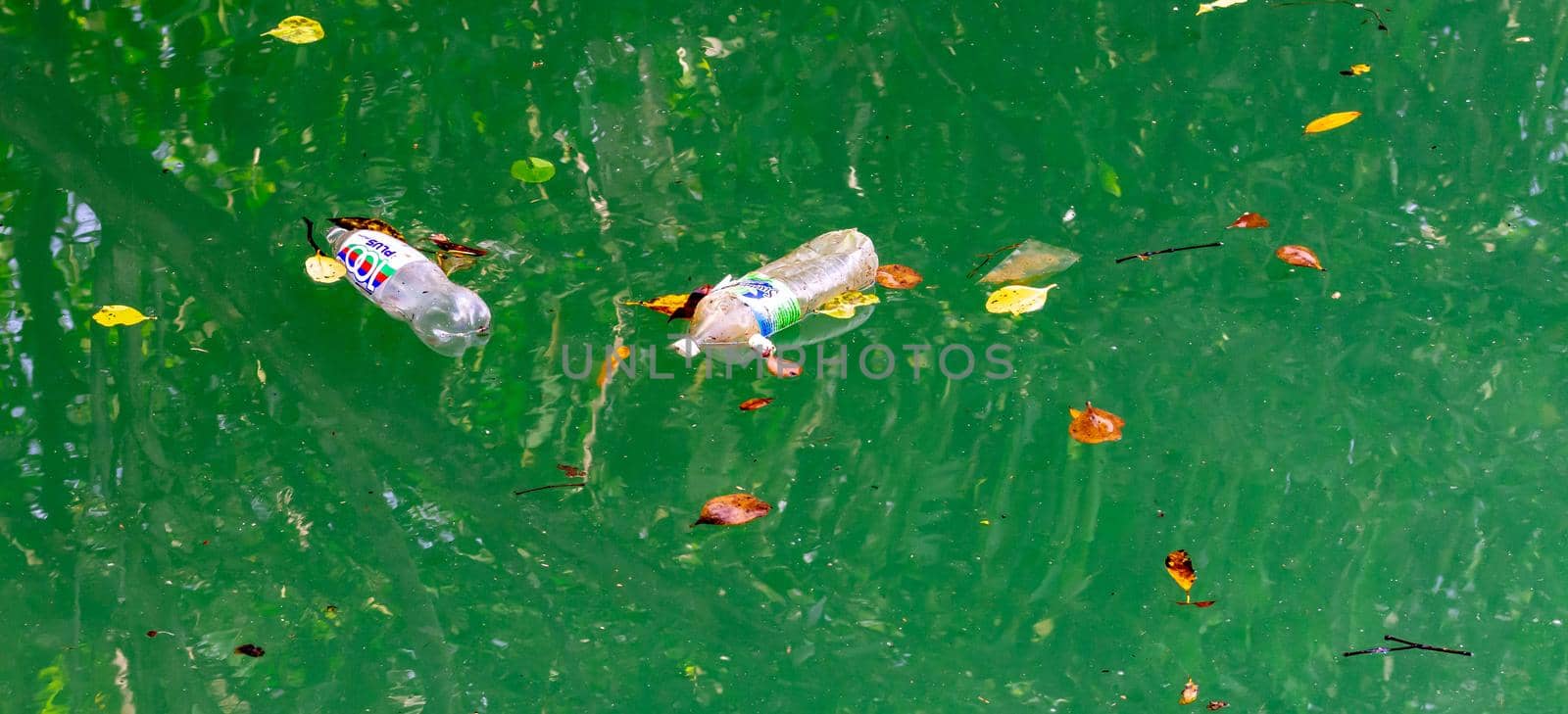 Bottled waters while floating on waters polluting the environment