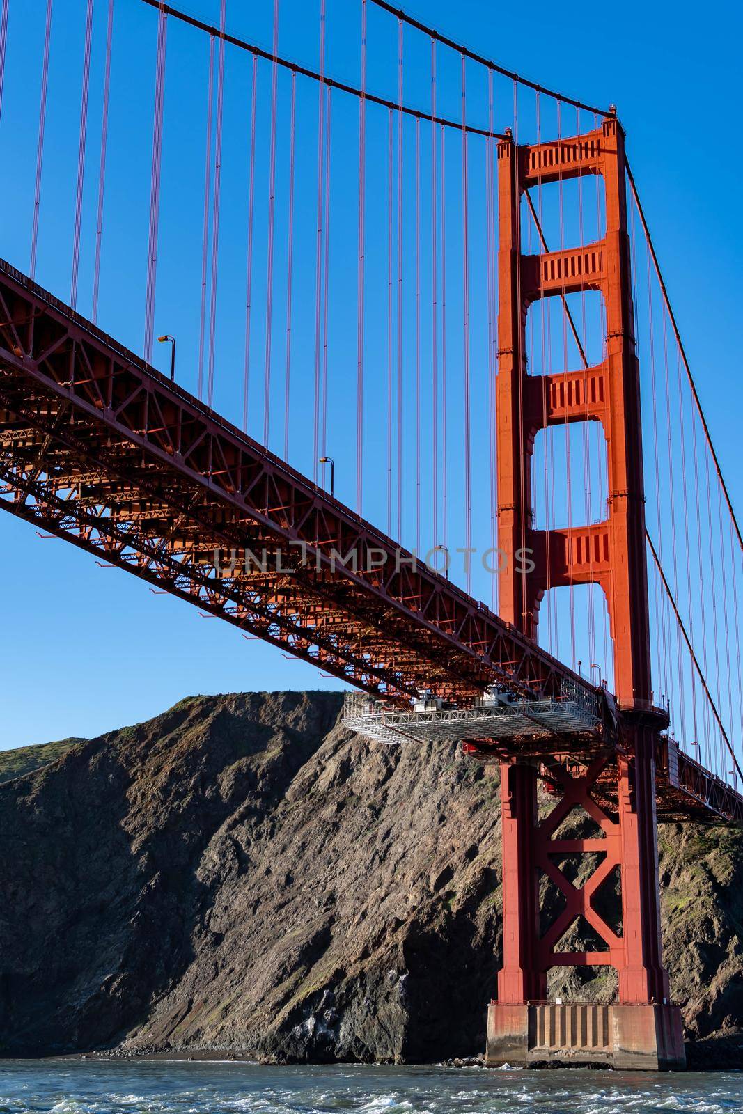 Famous Golden Gate Bridge in San Francisco California USA. The Golden Gate Bridge is a suspension bridge spanning the Golden Gate connecting San Francisco bay and pacific ocean