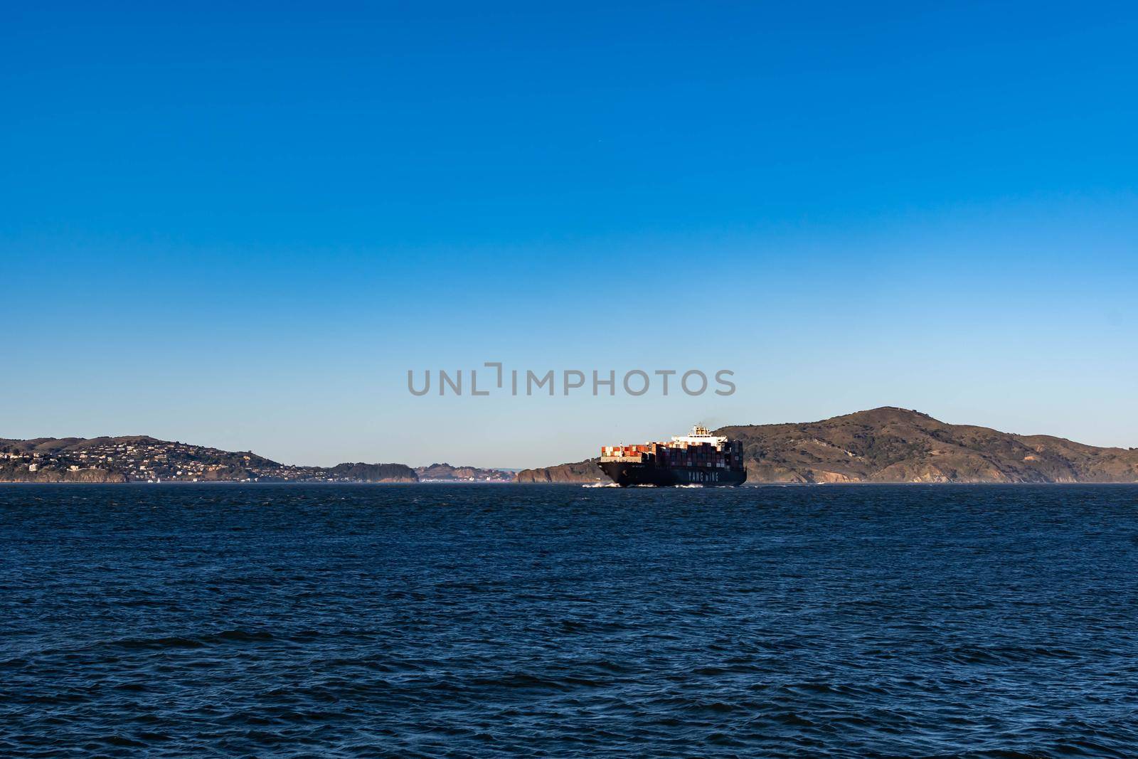 Container ship while cruising the pacific ocean near San Francisco Bay, San Francisco CA USA, March 30, 2020