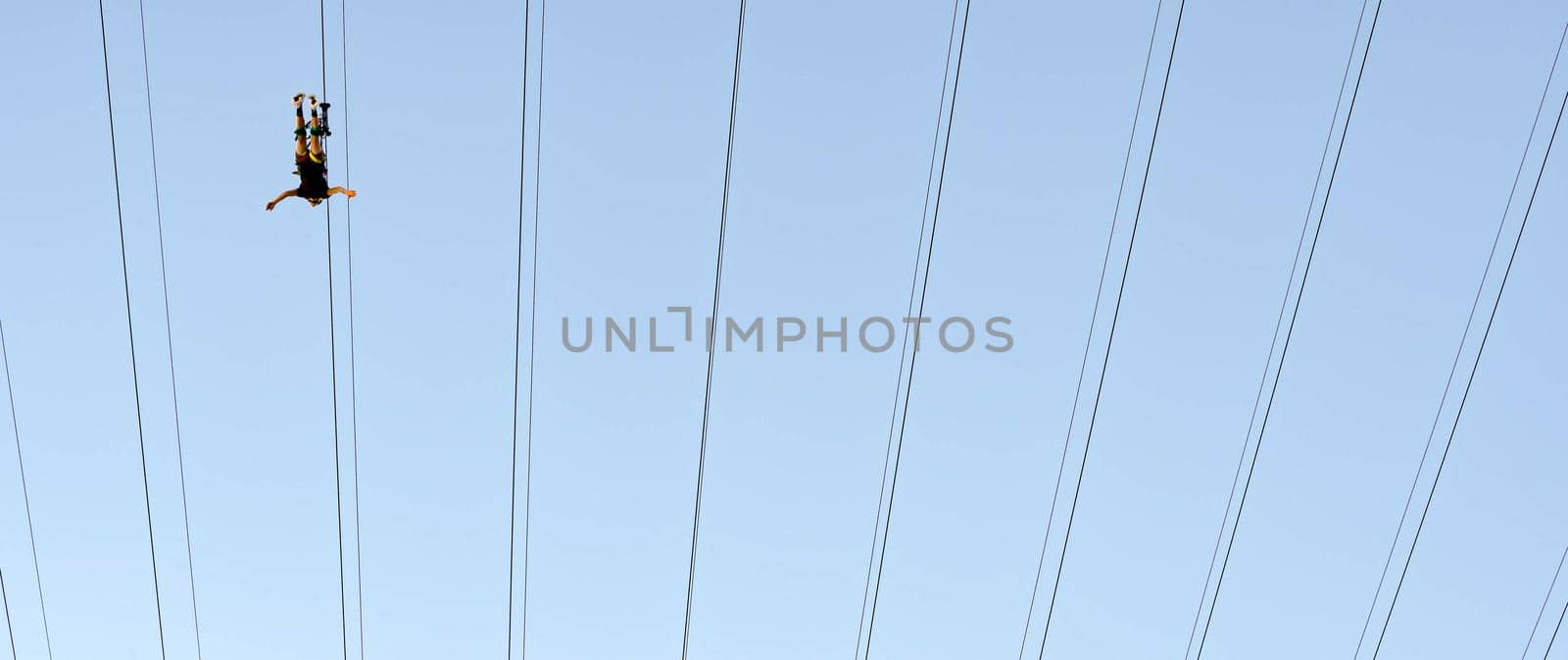 Tourist enjoying the FlyLinq Zipline at Las Vegas Strip, Las Vegas Nevada USA, March 30, 2020 by billroque