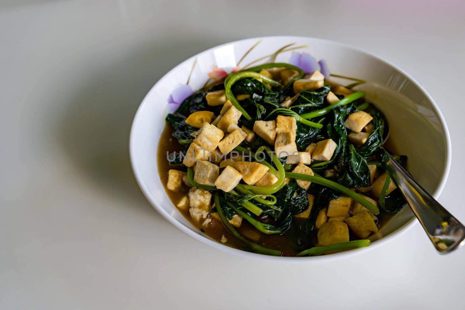 Healthy dish tofu soup with vegetable. Food good for the health and good source for protein and amino acids by billroque