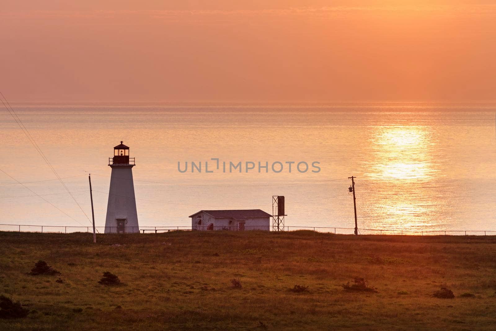 Enragee Point Lighthouse at sunset. Nova Scotia, Canada