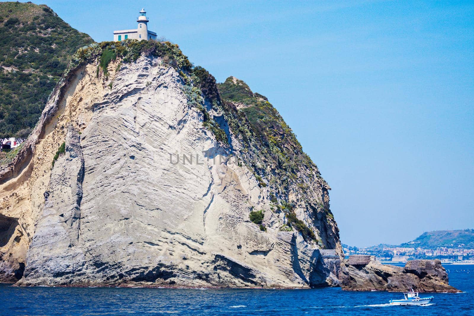 Capo Miseno Lighthouse on the cliff. Miseno, Campania, Italy
