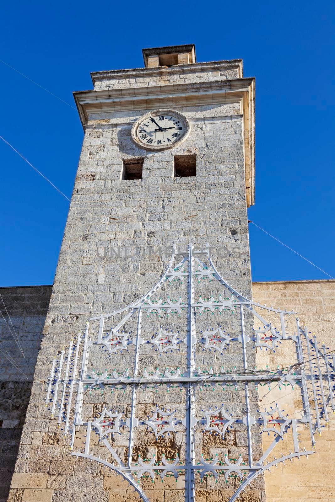 Castro architecture - clock tower. Castro, Apulia, Italy