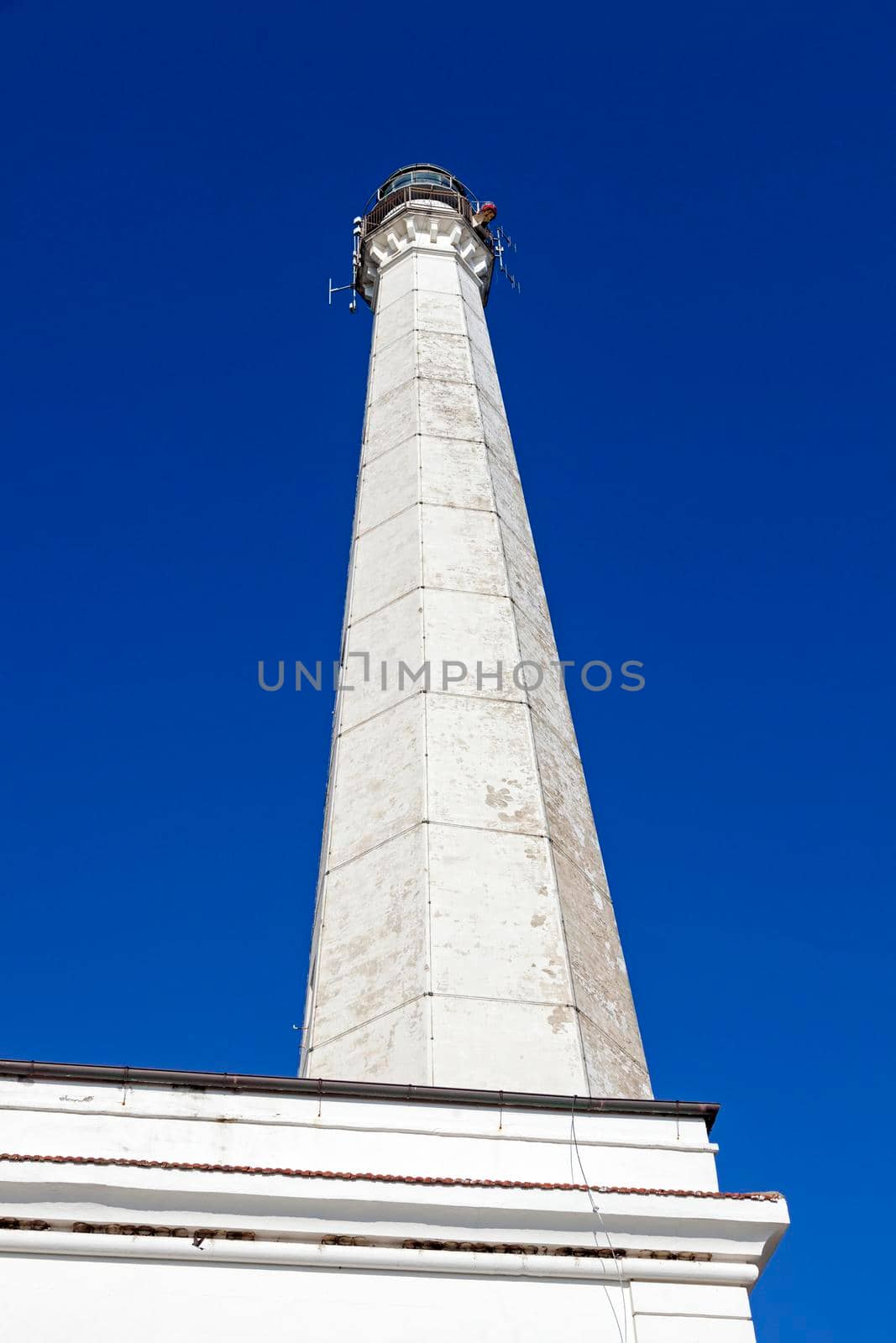 Punta Penna Lighthouse against blue sky. Abruzzo, Italy