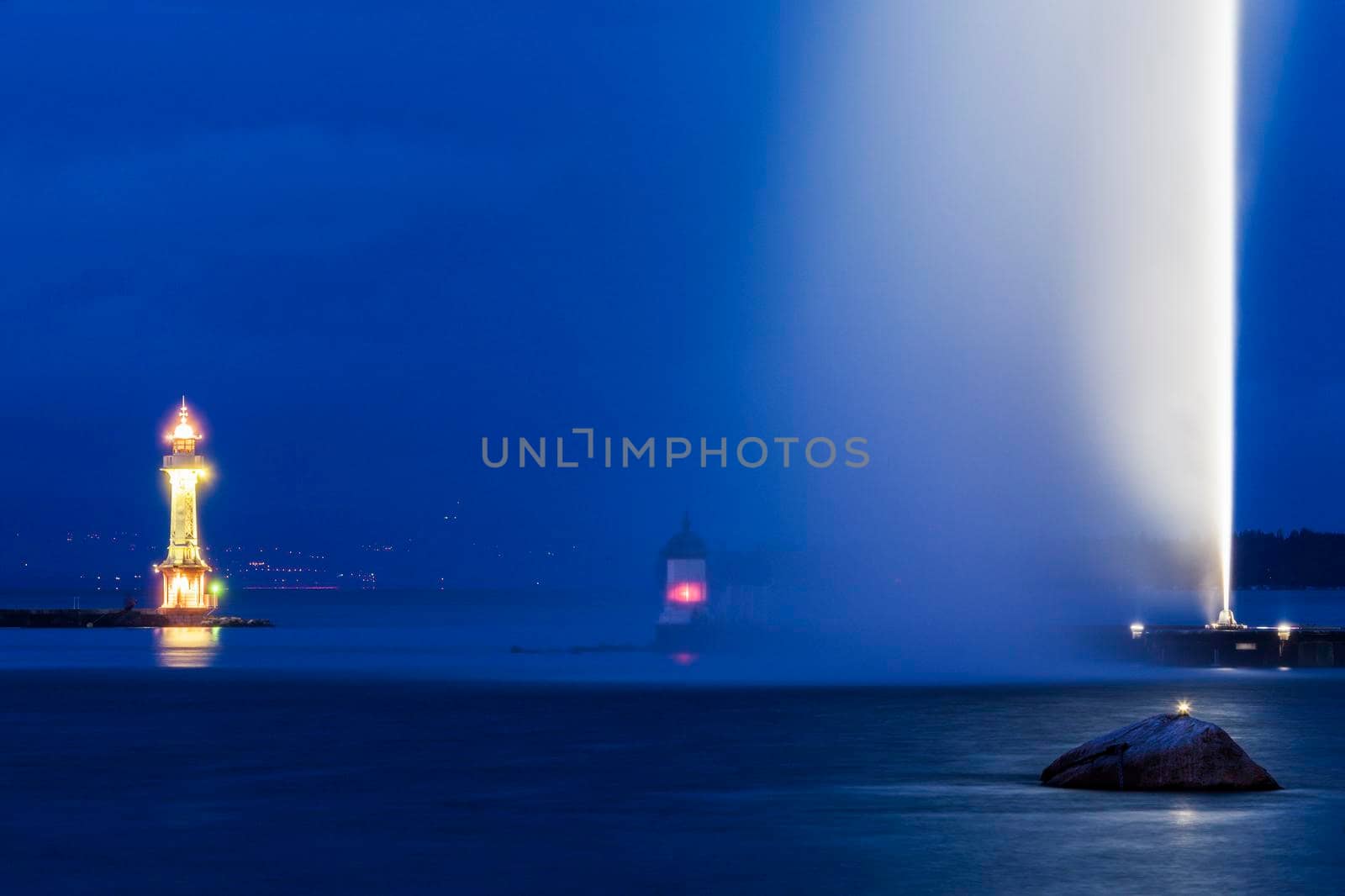 Geneva Lighthouse at night. Geneva, Switzerland.