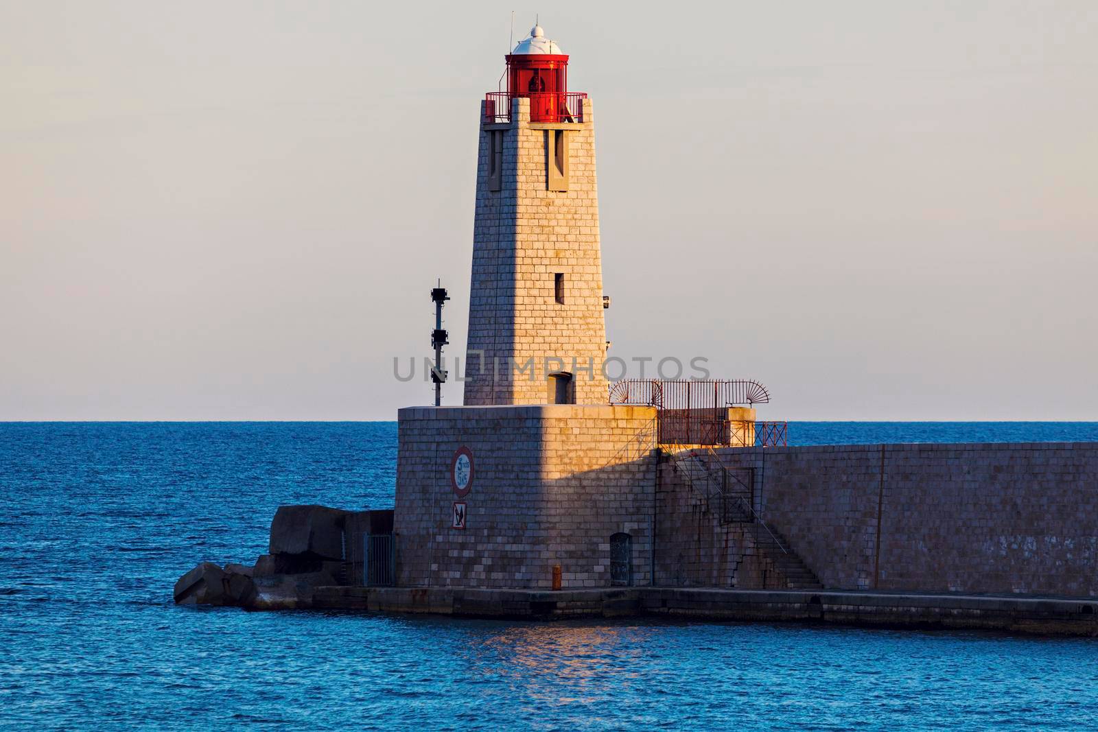 Nice Lighthouse at sunset. Nice, French Riviera, France.