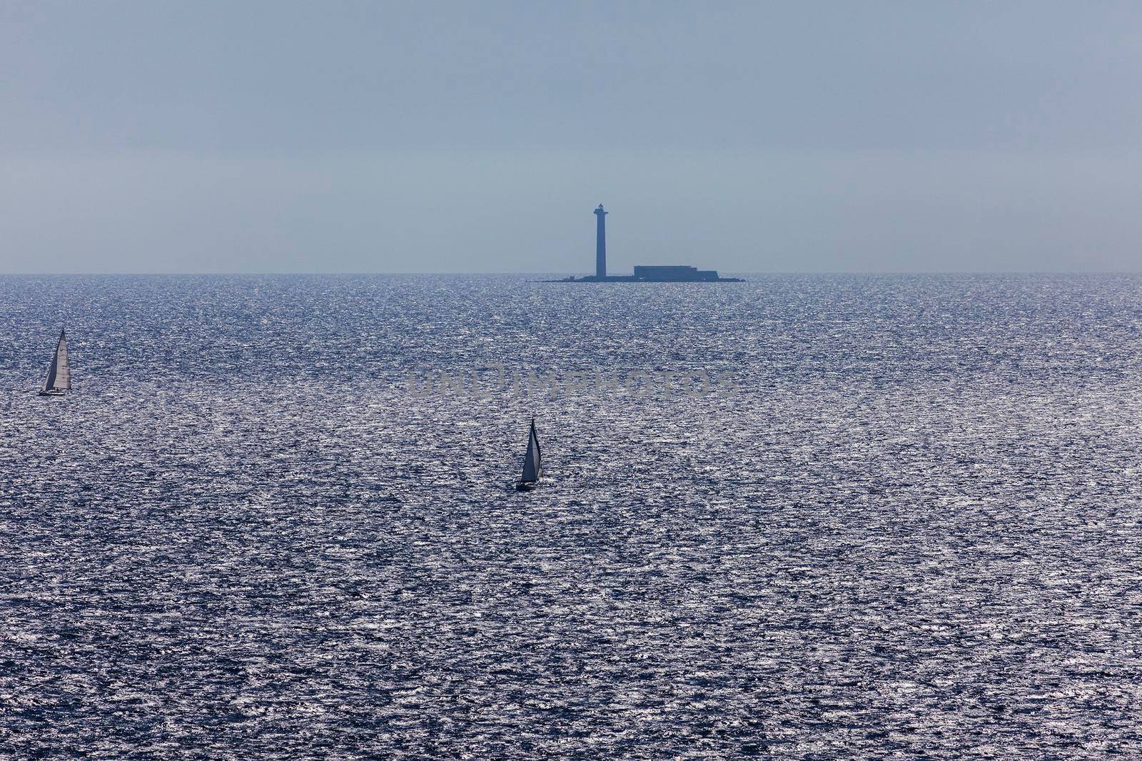 Lone lighthouse on the Mediterranean Sea. Marseille, Provence-Alpes-Cote d'Azur, France.