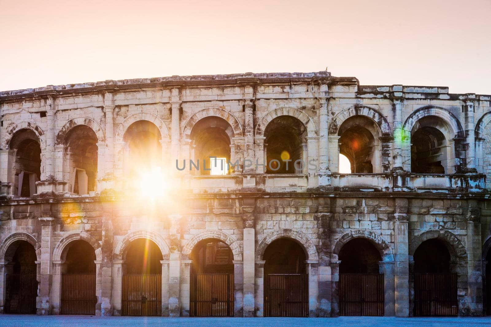 Arena of Nimes at sunrise. Nimes, Occitanie, France.