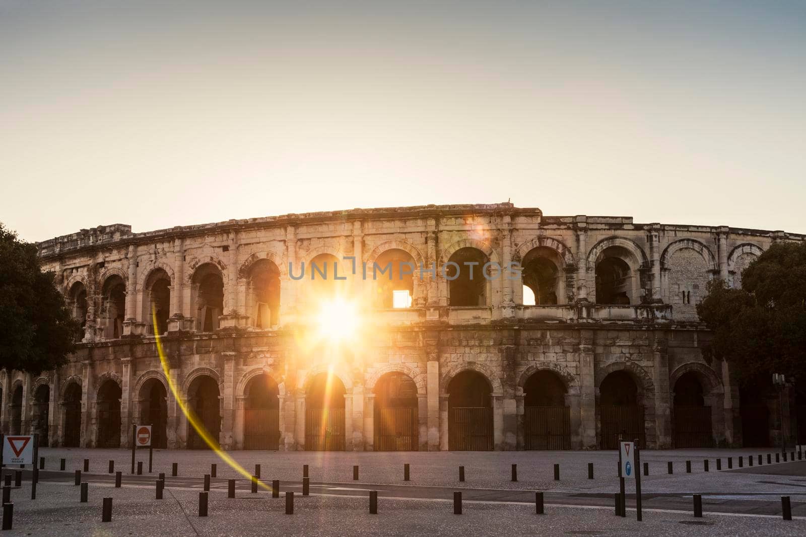 Arena of Nimes at sunrise. Nimes, Occitanie, France.