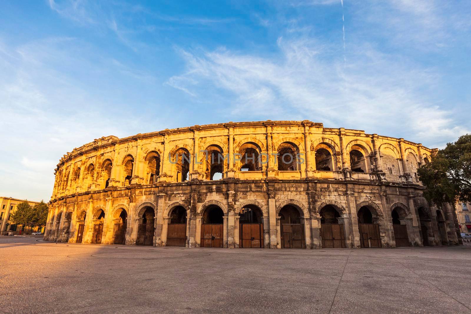 Arena of Nimes at sunset. Nimes, Occitanie, France.
