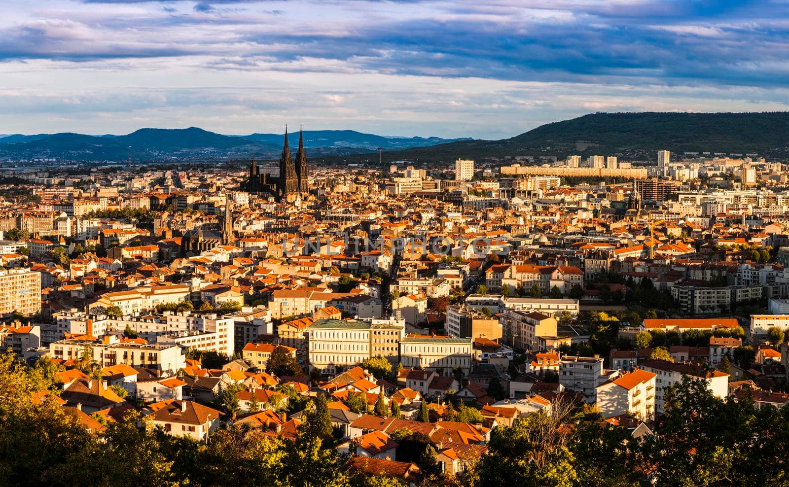 Panorama of Clermont-Ferrand at sunset. Clermont-Ferrand, Auvergne-Rhone-Alpes, France.