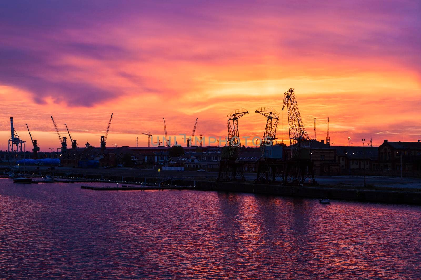 Old cranes in Szczecin at sunrise. Szczecin, West Pomeranian, Poland