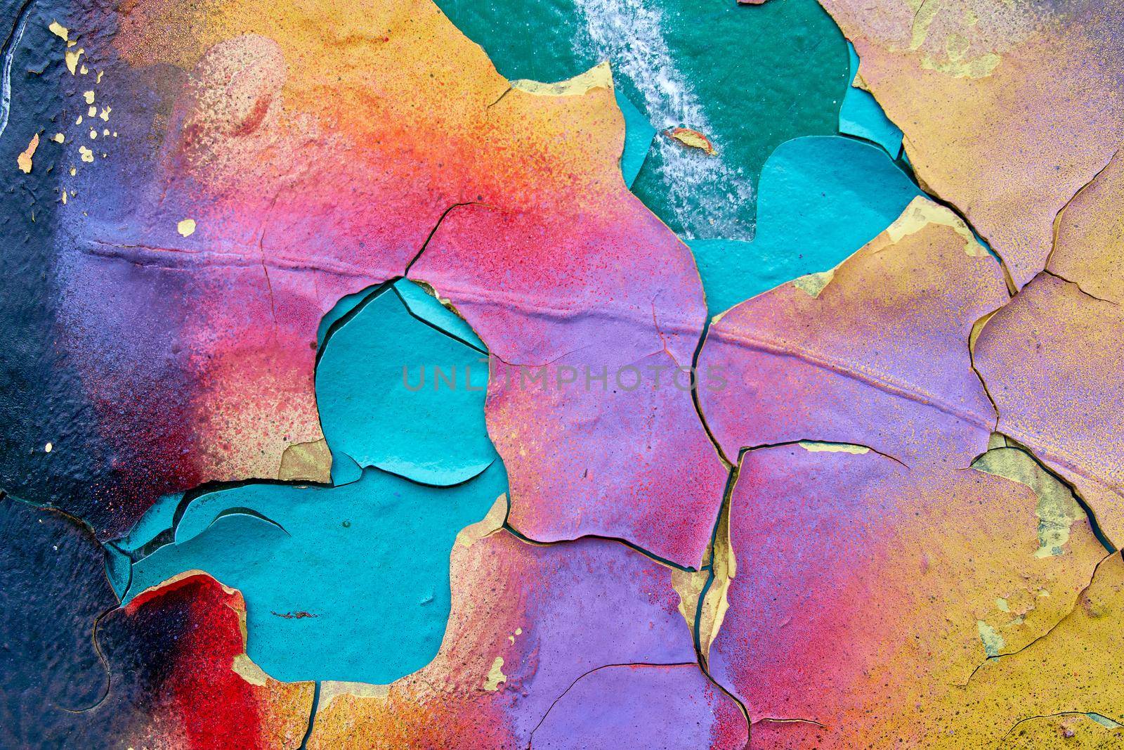 Metallic colorful background with peeling paint and bright spots and rust, texture.