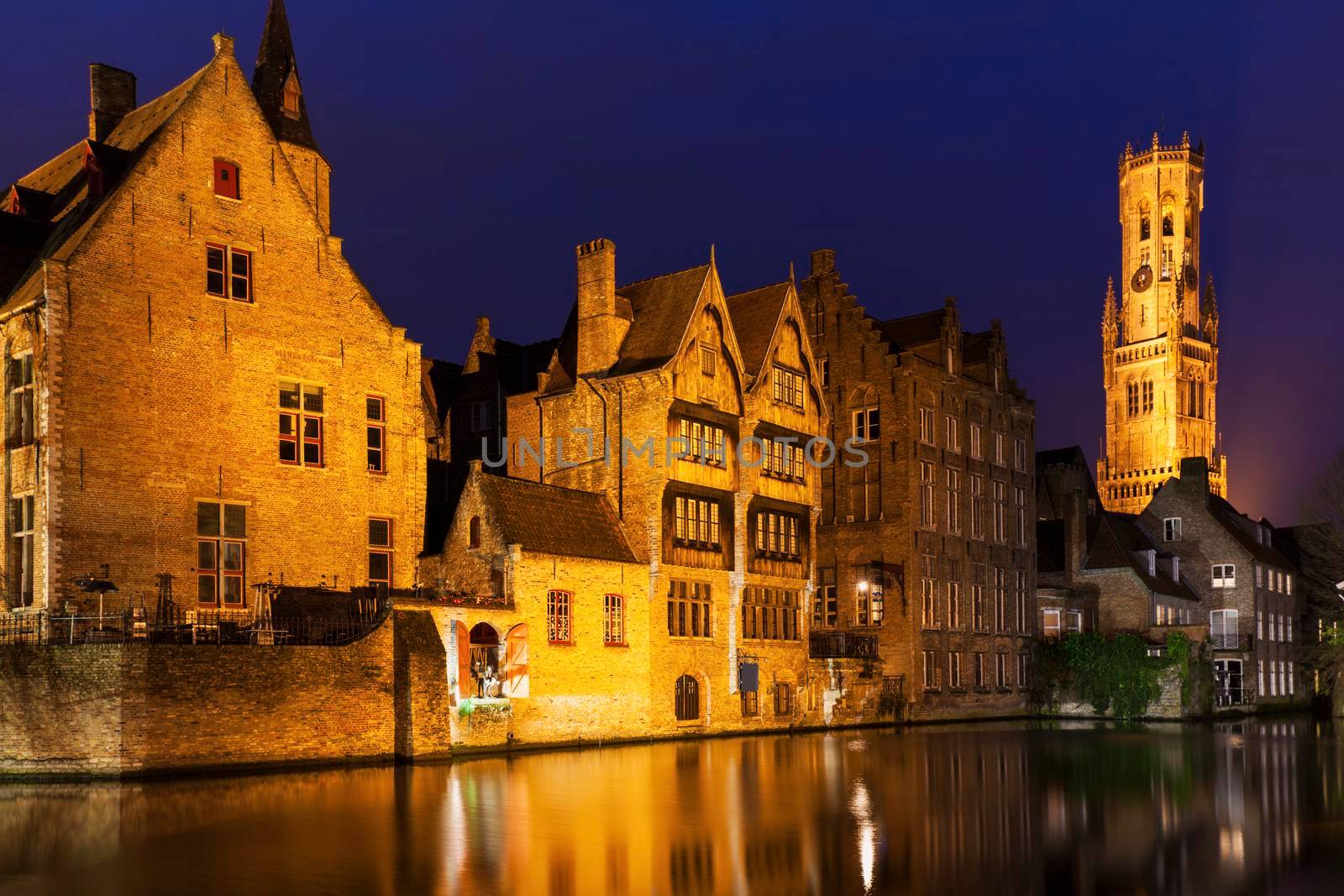 Belfry of Bruges reflected in the canal by benkrut