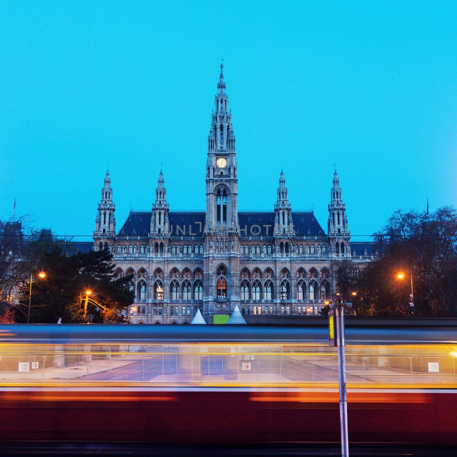 Vienna City Hall and blurred tramway. Vienna, Austria.