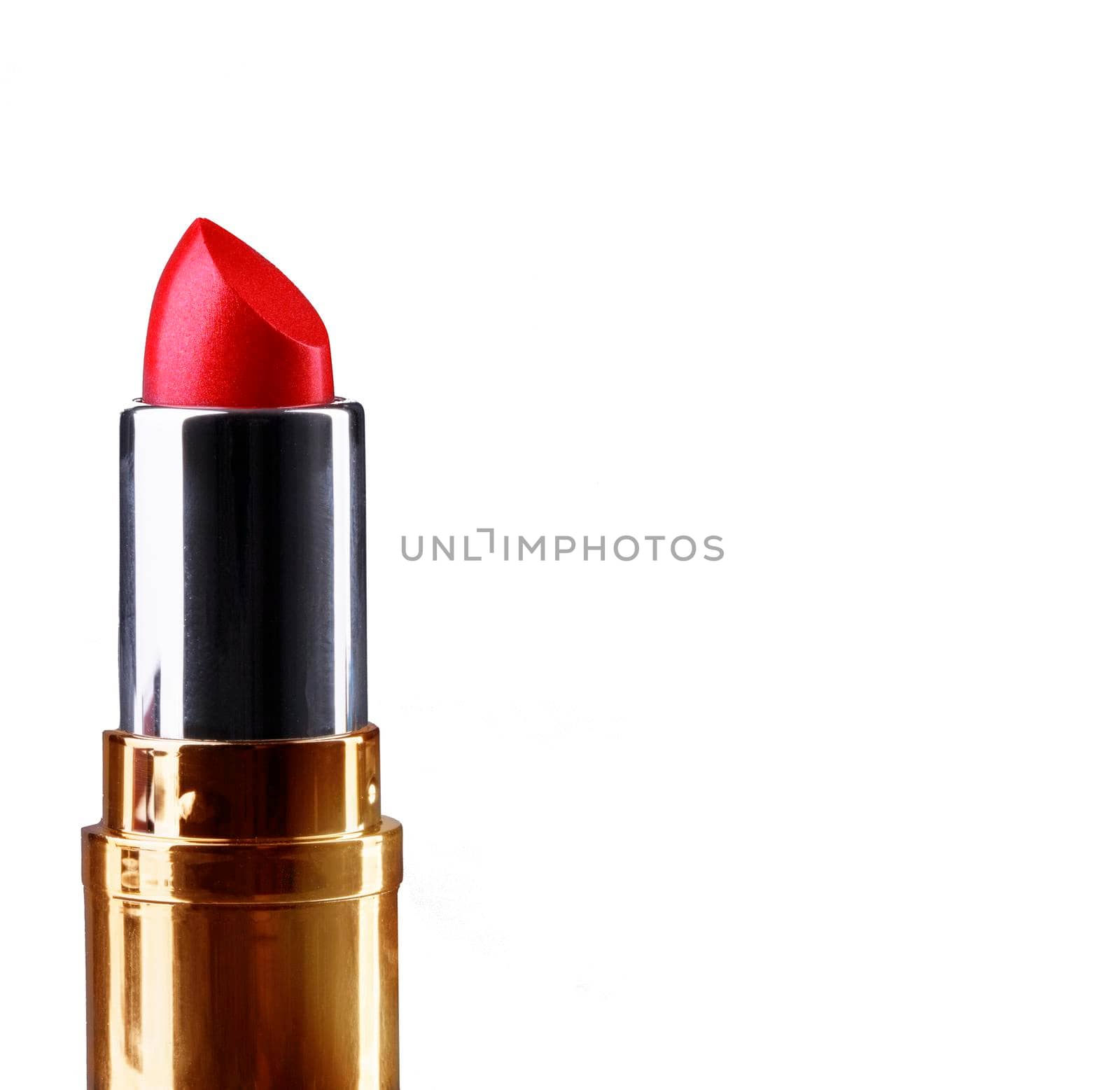 Red lipstick in a gold case. Cosmetics for lips. Makeup.
