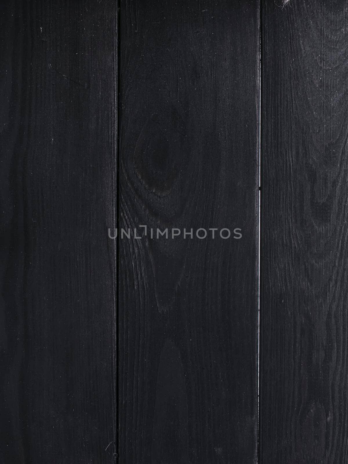 Black wood texture. Background dark boards.