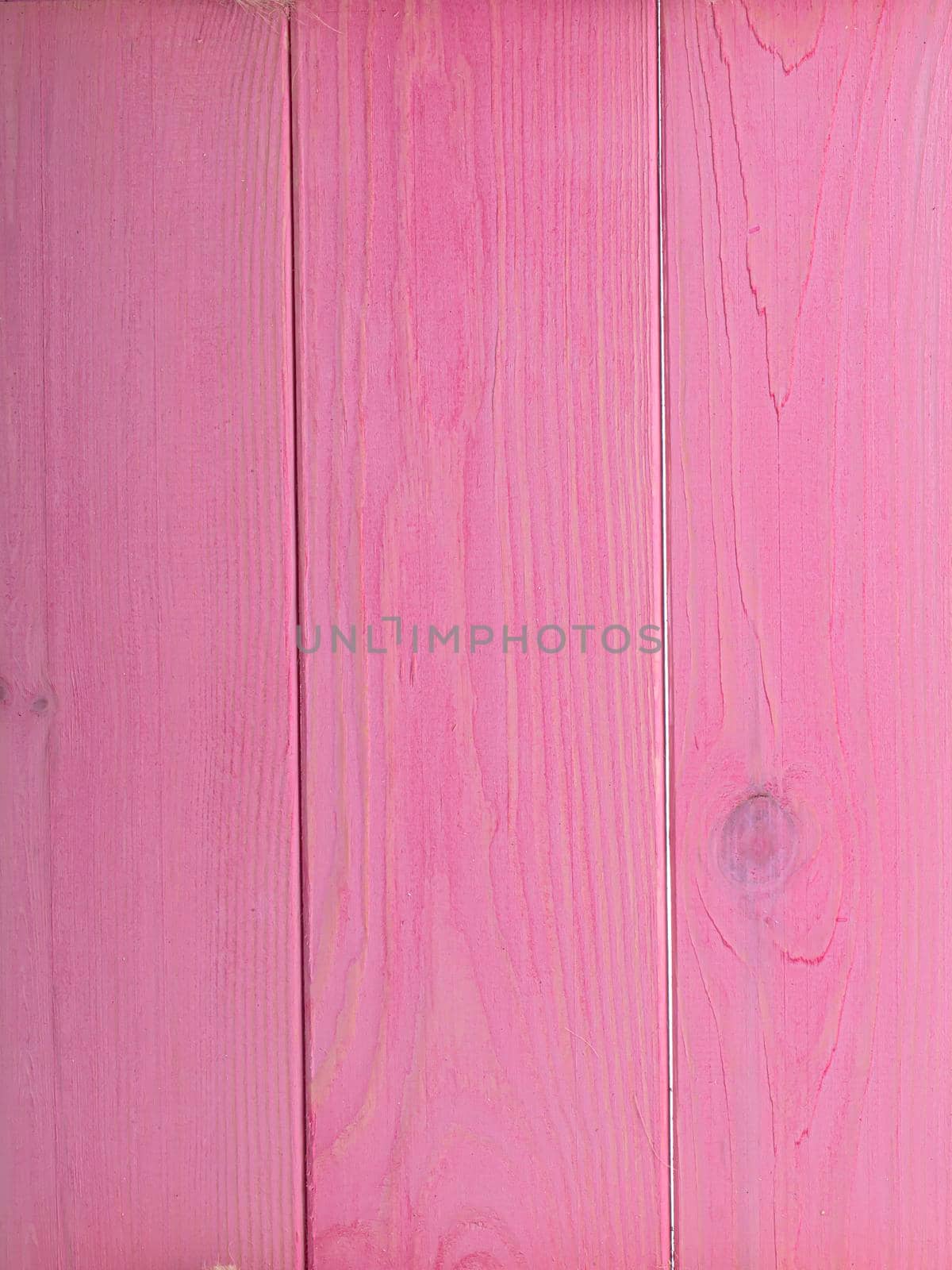 Pink wood texture. Background bright boards.