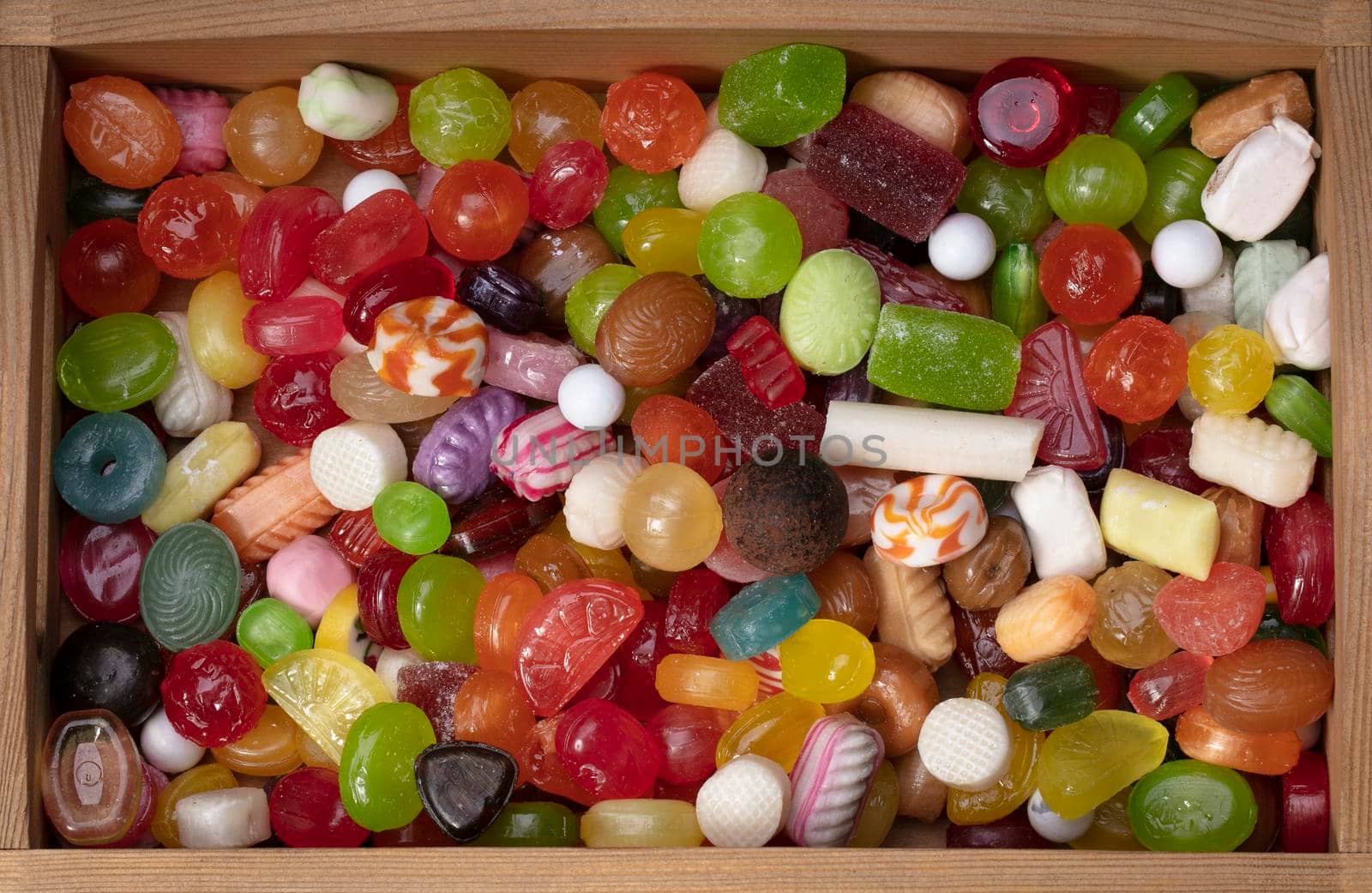 Many sweets. Multi-colored caramel. Background sweets.