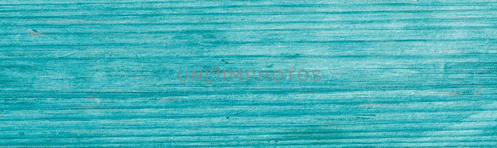 Turquoise wooden banner. Background wooden texture of turquoise color.
