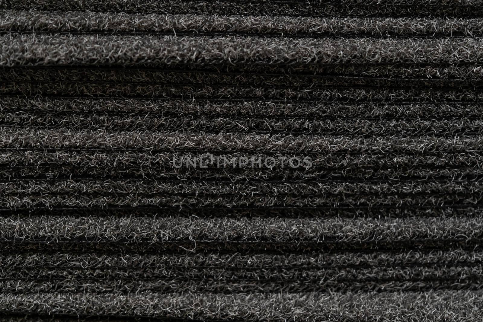 Black carpet for sale. Carpets placed on top of each other