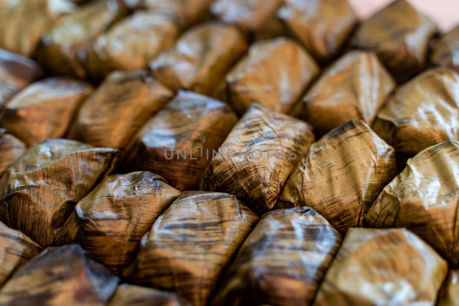 "Khao Tom Mud" Thai dessert, Steamed sticky rice with banana.