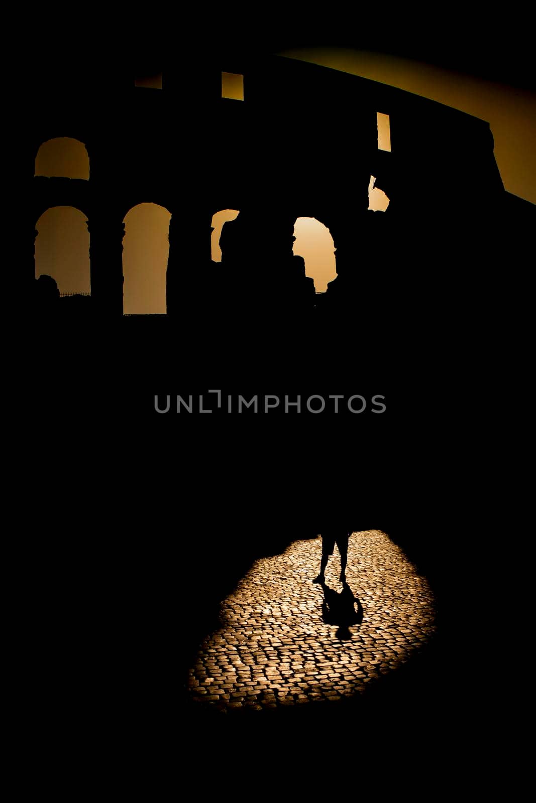 Street photography represents the shadows that arise at sunset time