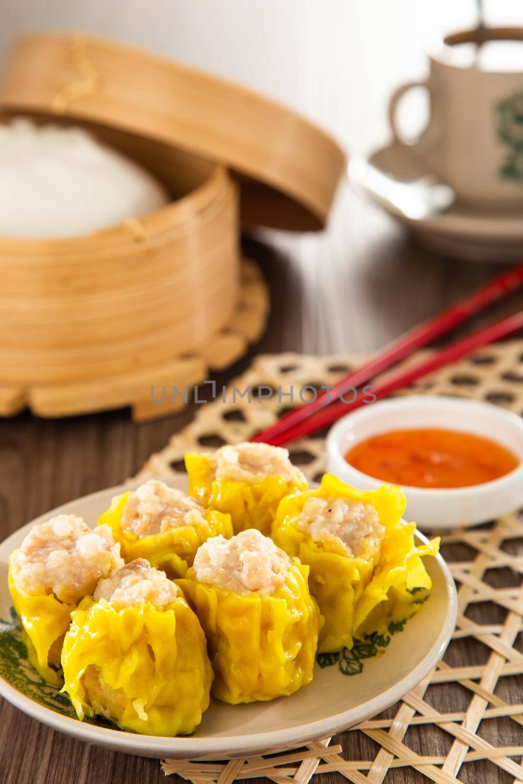 Siu Mai - Chinese steamed pork dumplings in bamboo steamers. Dim Sum by tehcheesiong