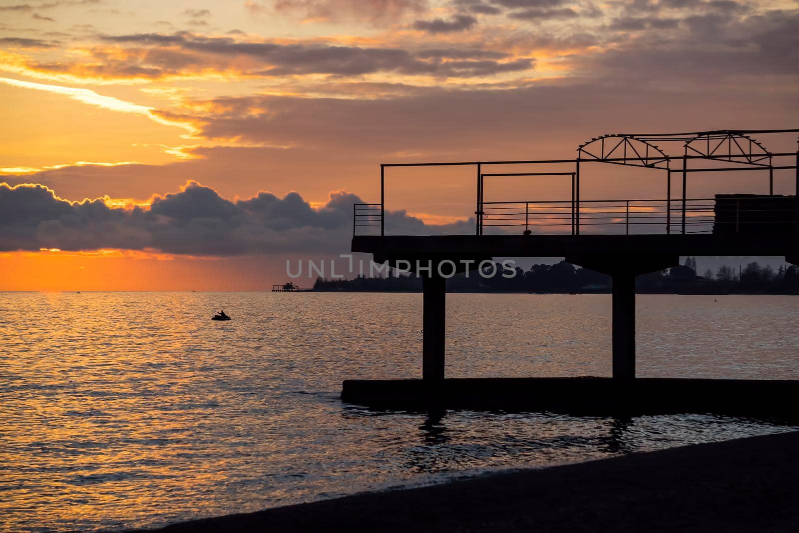 Seascape with beautiful sunsets and silhouettes.
