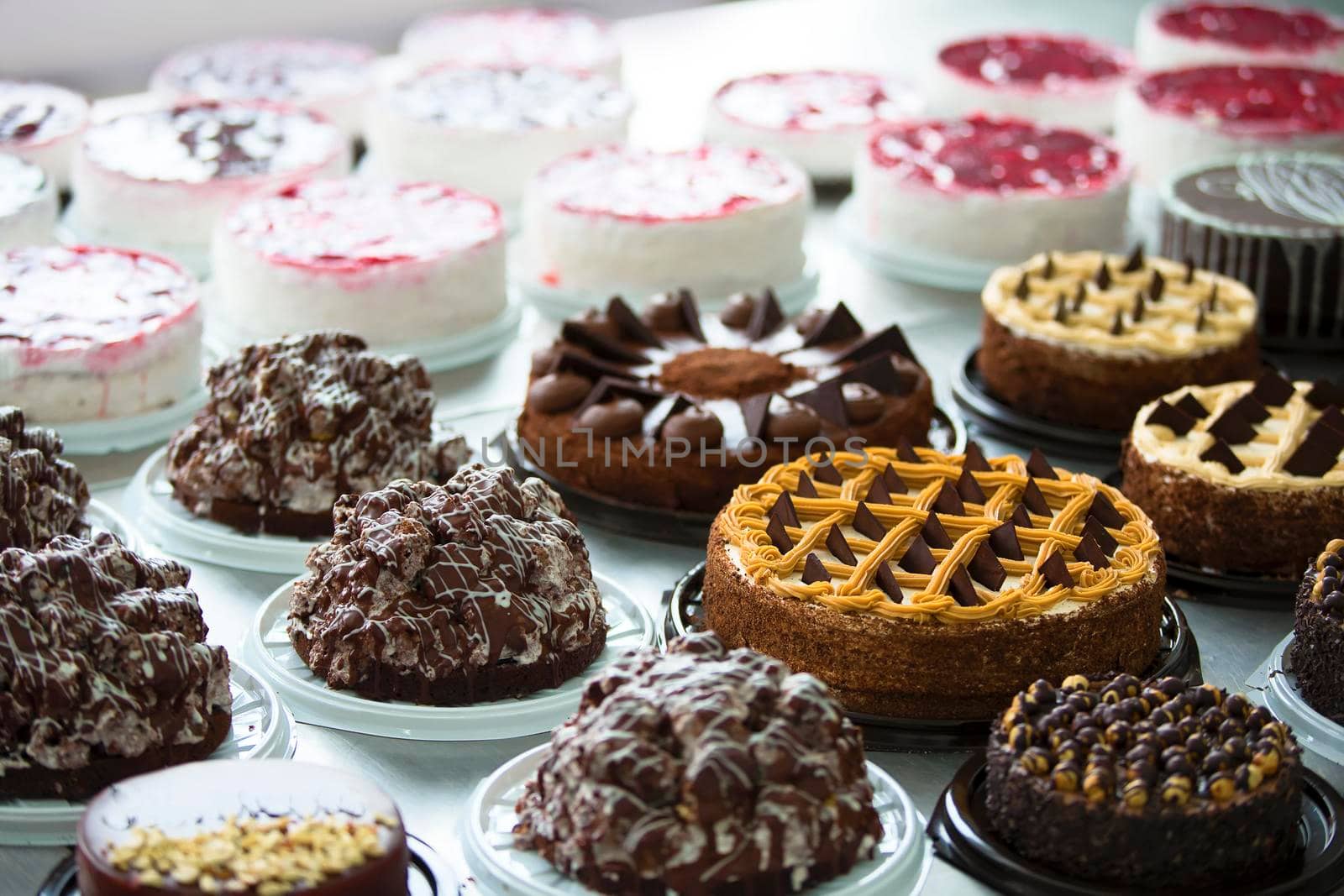Many cakes on the table. Industrial Cake Line