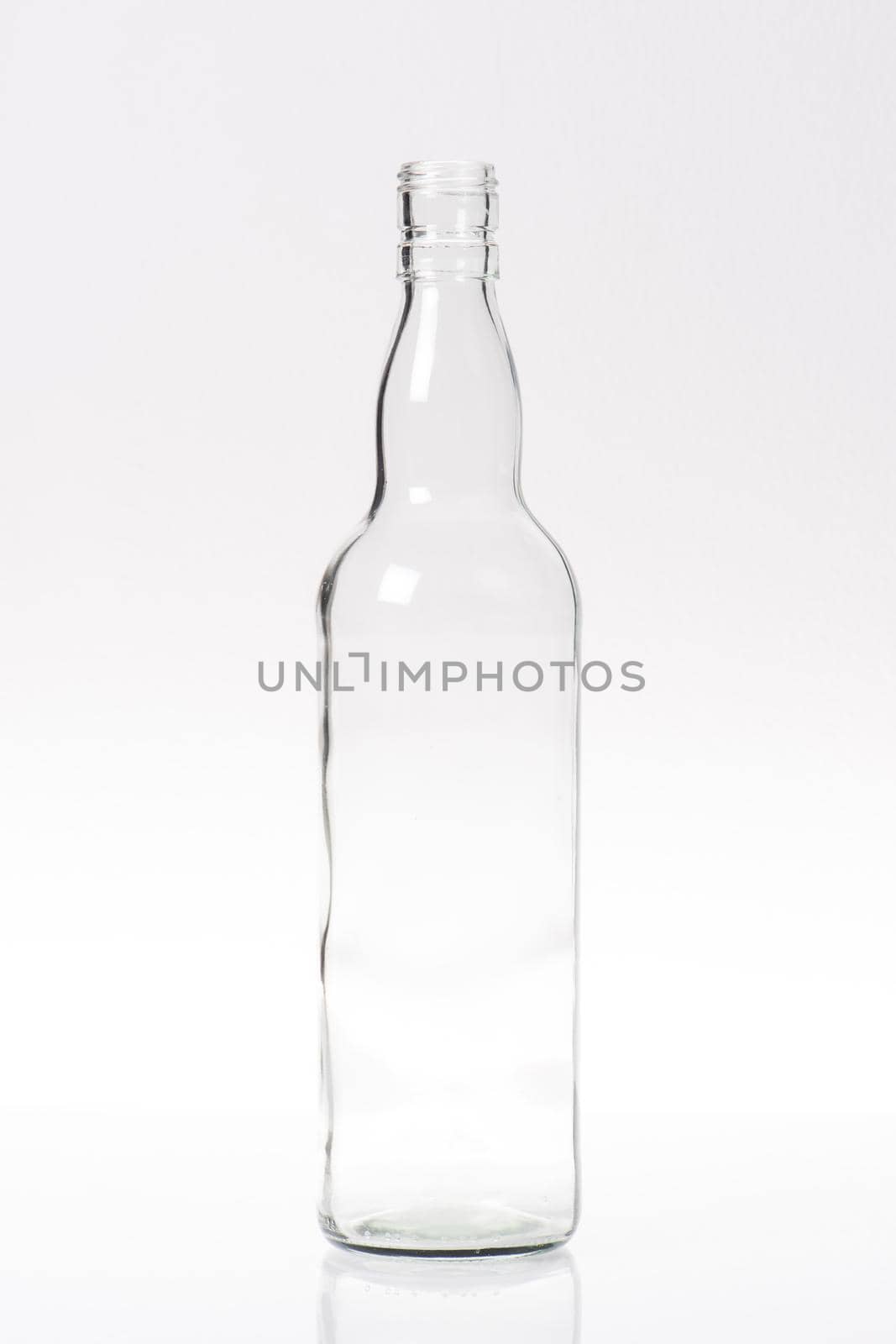 glass bottle over white backgroud by norgal