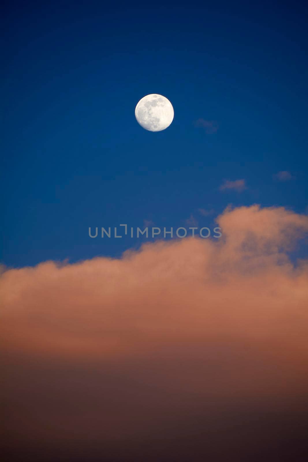 Moon in blue sky with white clouds, blue sky, empty space, heaven