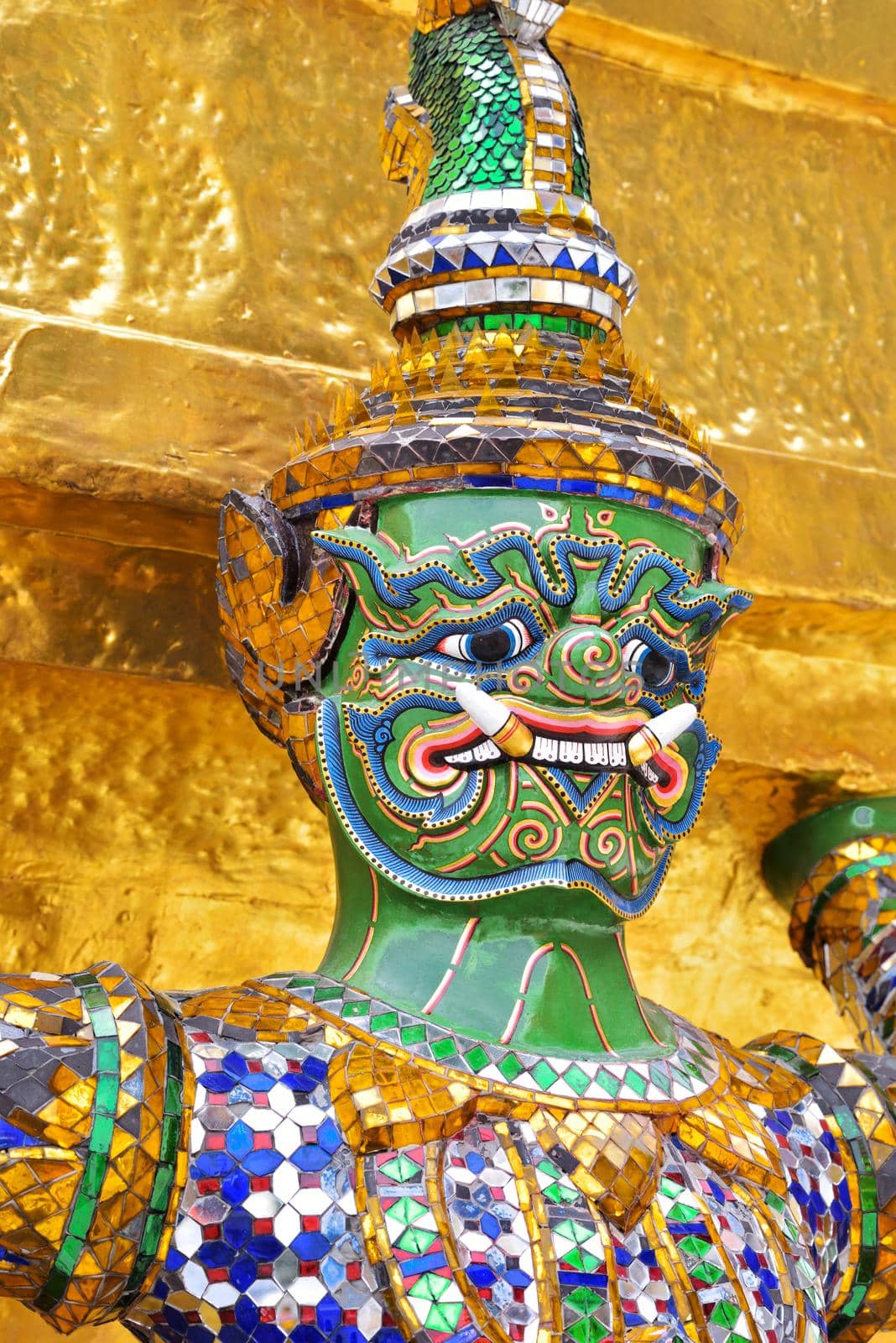 closeup face of Yak(giant) statue at Wat Phra Kaew in Bangkok, Thailand.