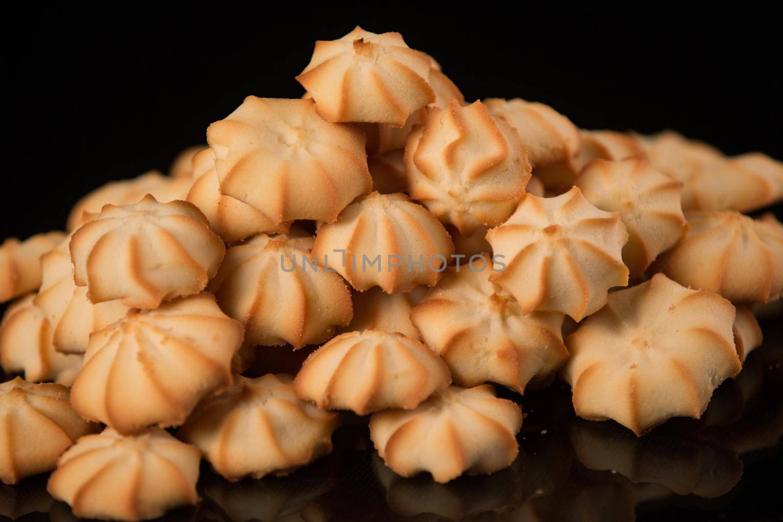 Shortbread cookie closeup on a dark background