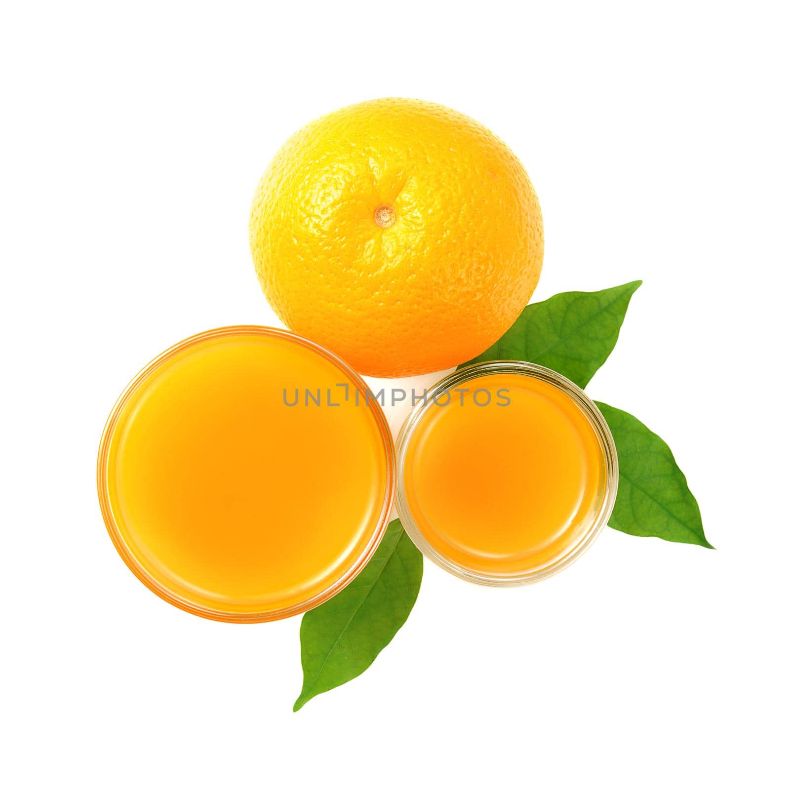 Ripe orange and cup of orange juice