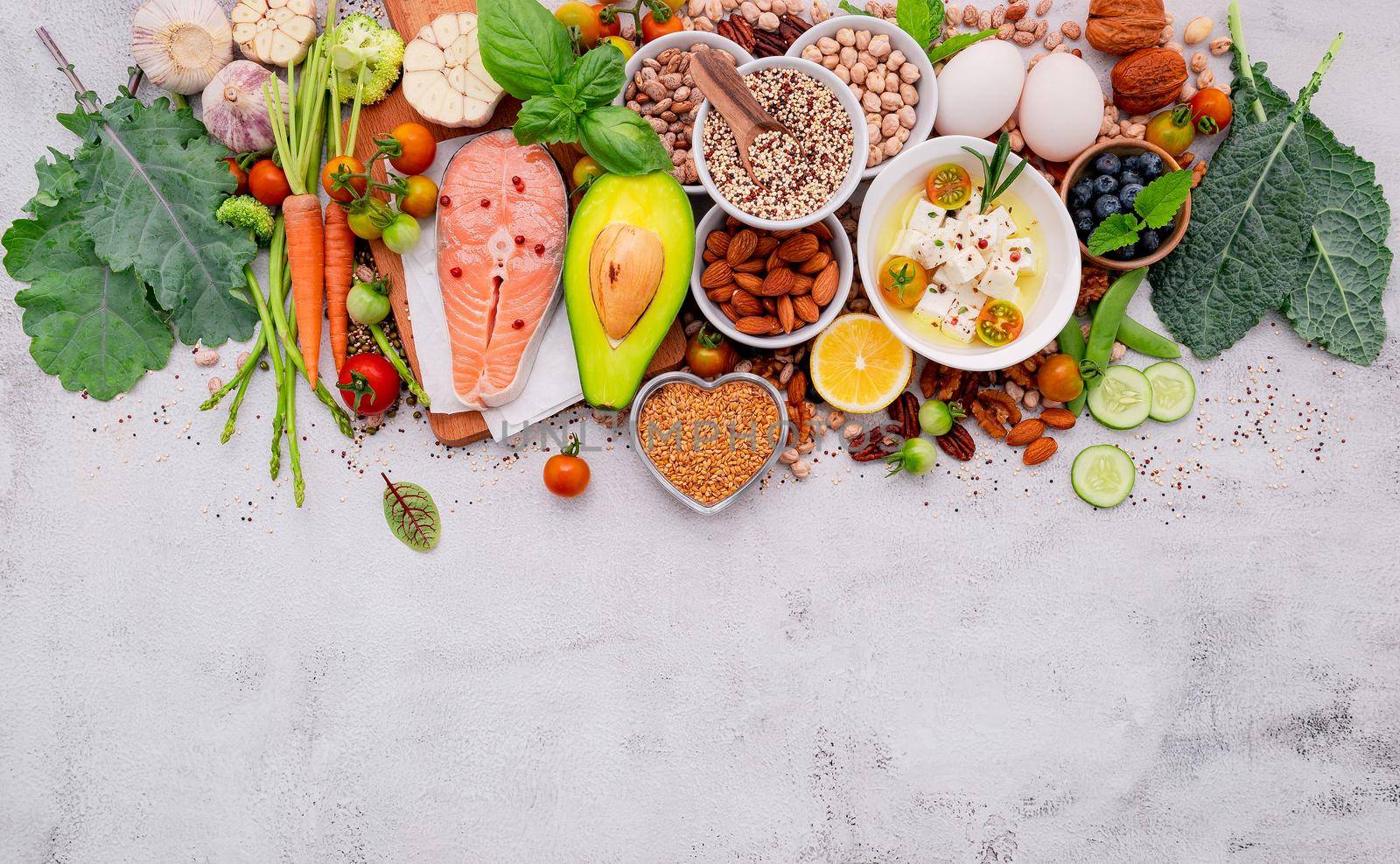 Ketogenic low carbs diet concept. Ingredients for healthy foods selection set up on white concrete background.