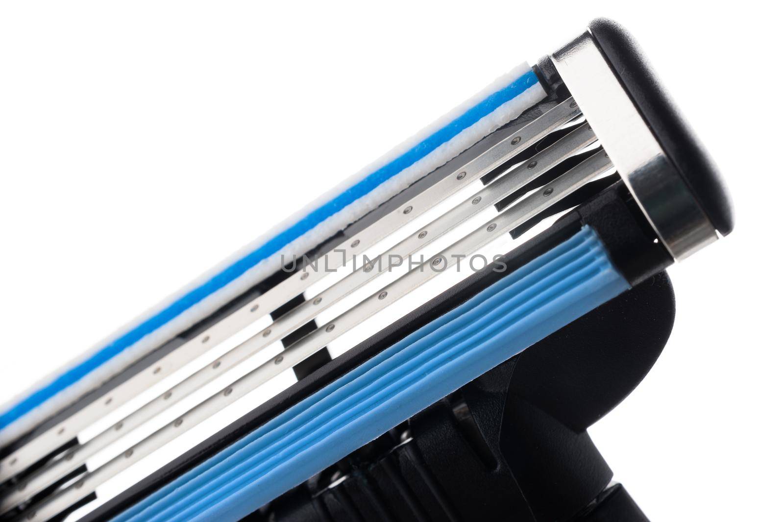 closeup new multiple blade razor on white background