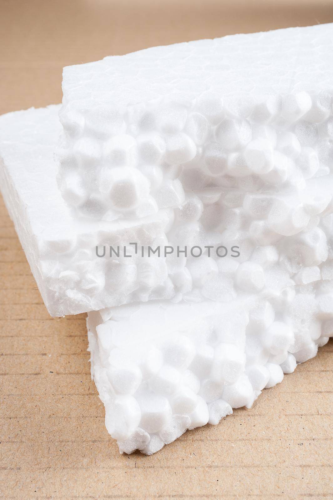 closeup white foam on cardboard