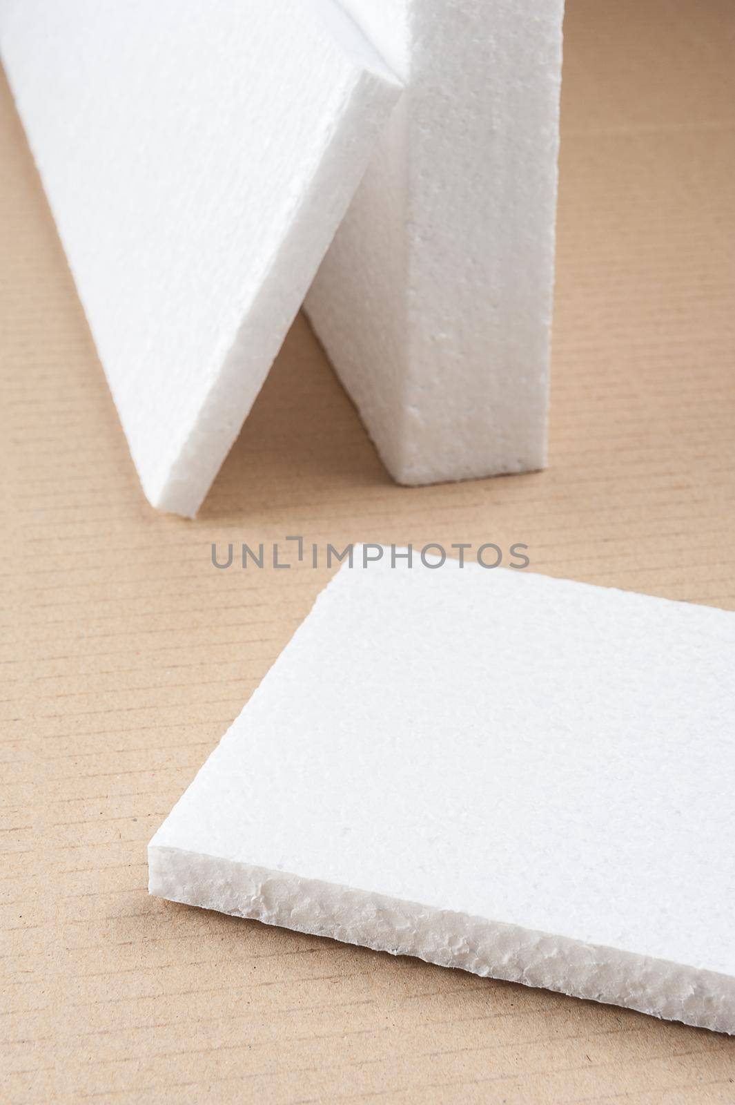 closeup white foam on cardboard
