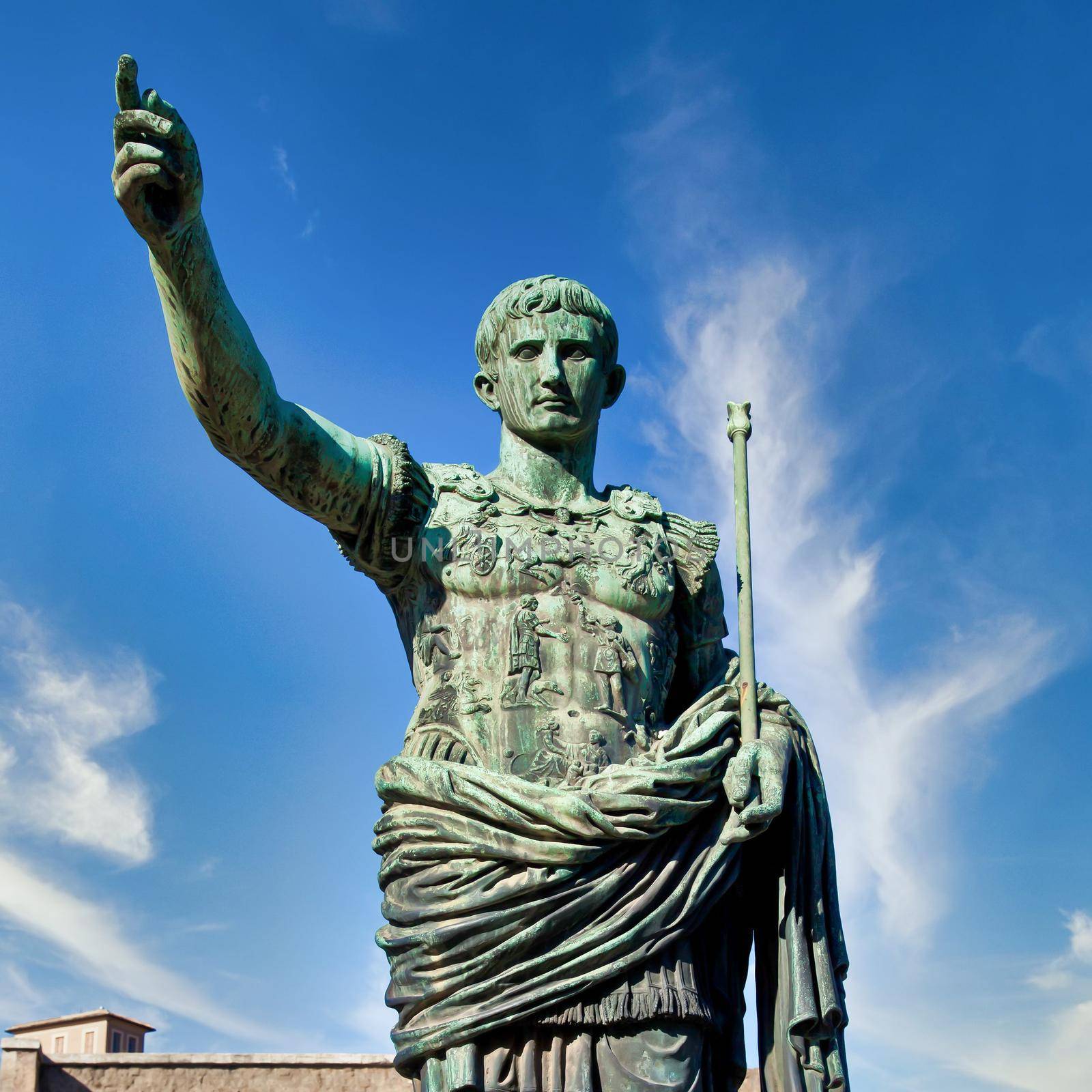 The roman emperor Gaius Julius Caesar statue in Rome, Italy. Concept for authority, domination, leadership and guidance. by Perseomedusa
